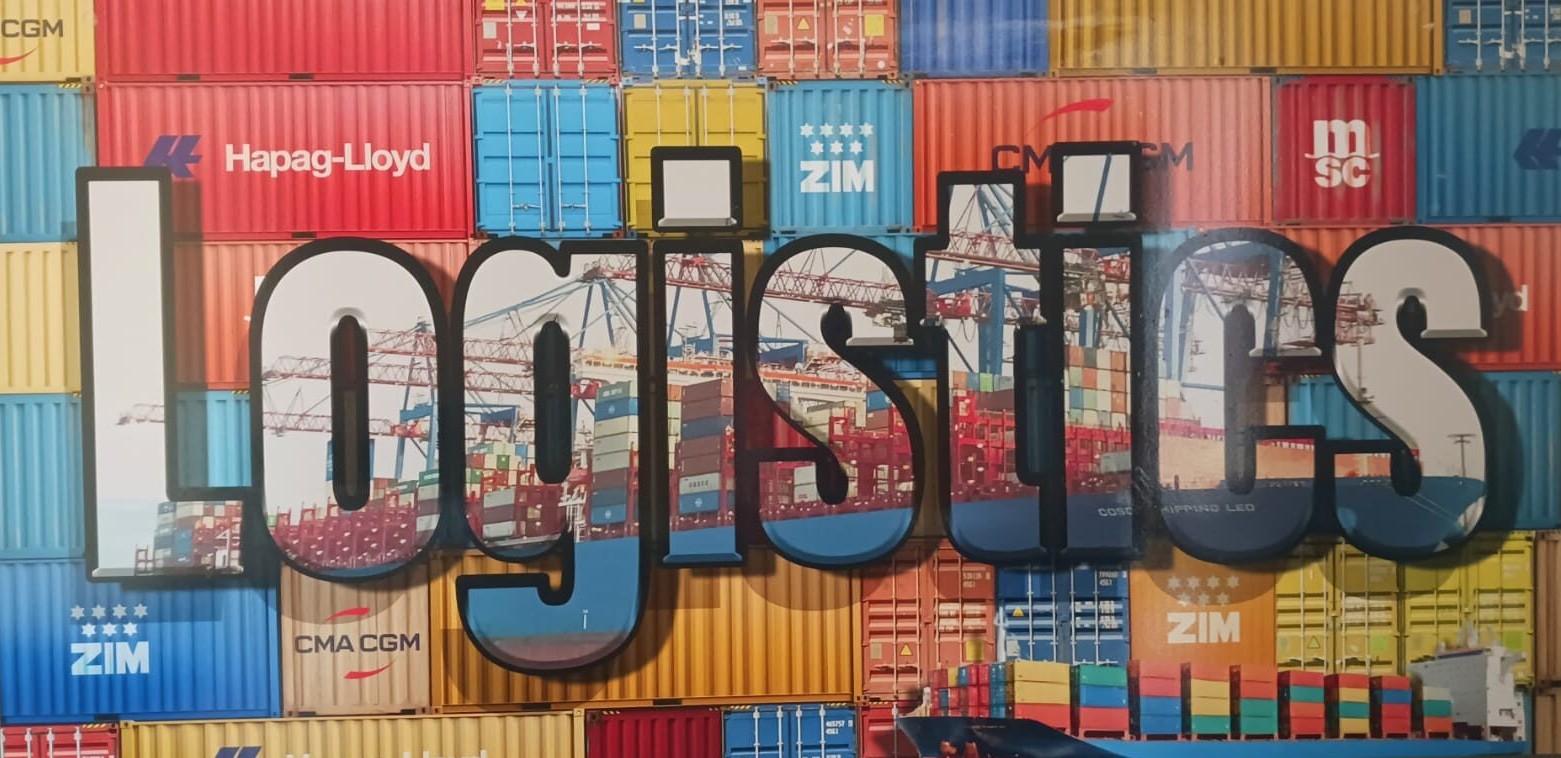 Stacked international shipping containers at port